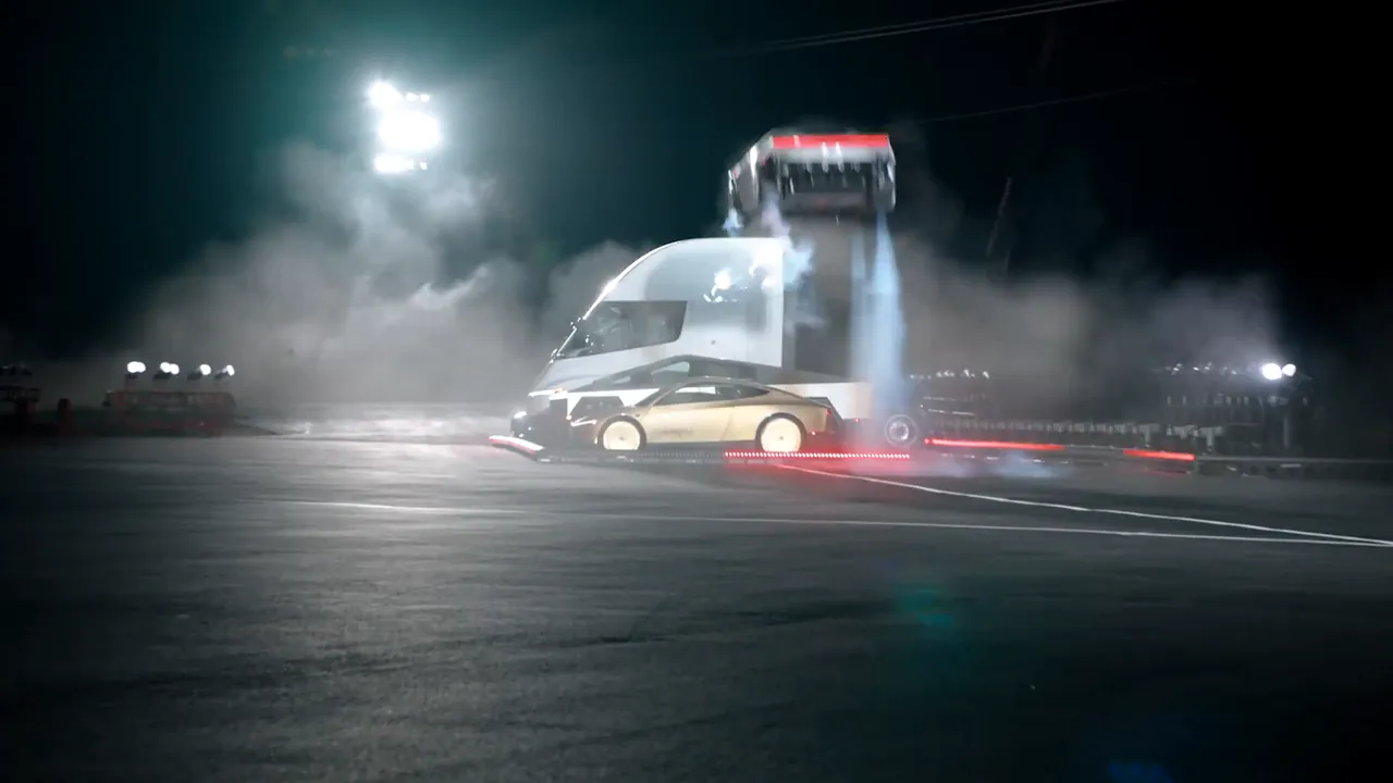 The Roadster flipping over the Tesla Semi and a gold Cybercab under floodlights
